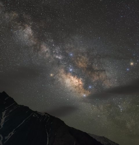 Gorgeous night sky view of the Milky Way over mountainous landscape in Kaza, India.